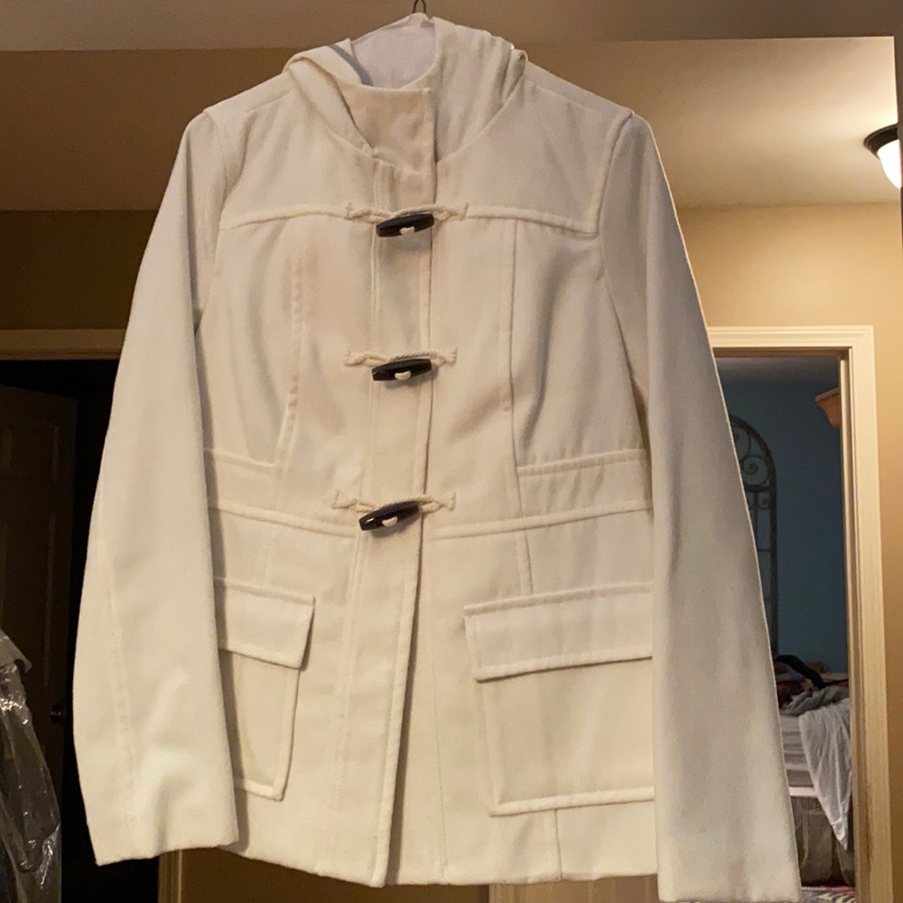 White size small pea coat with hood. Great condition & cute detailing